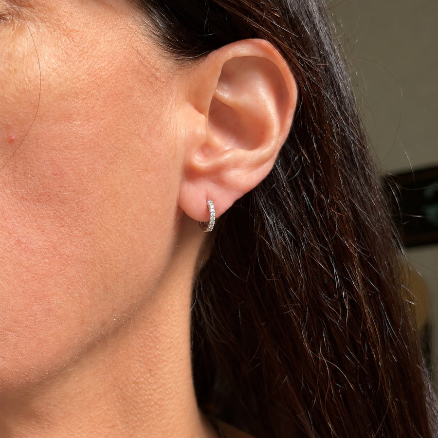 X-Small 7mm Pavé-All-Day hoop on an earlobe