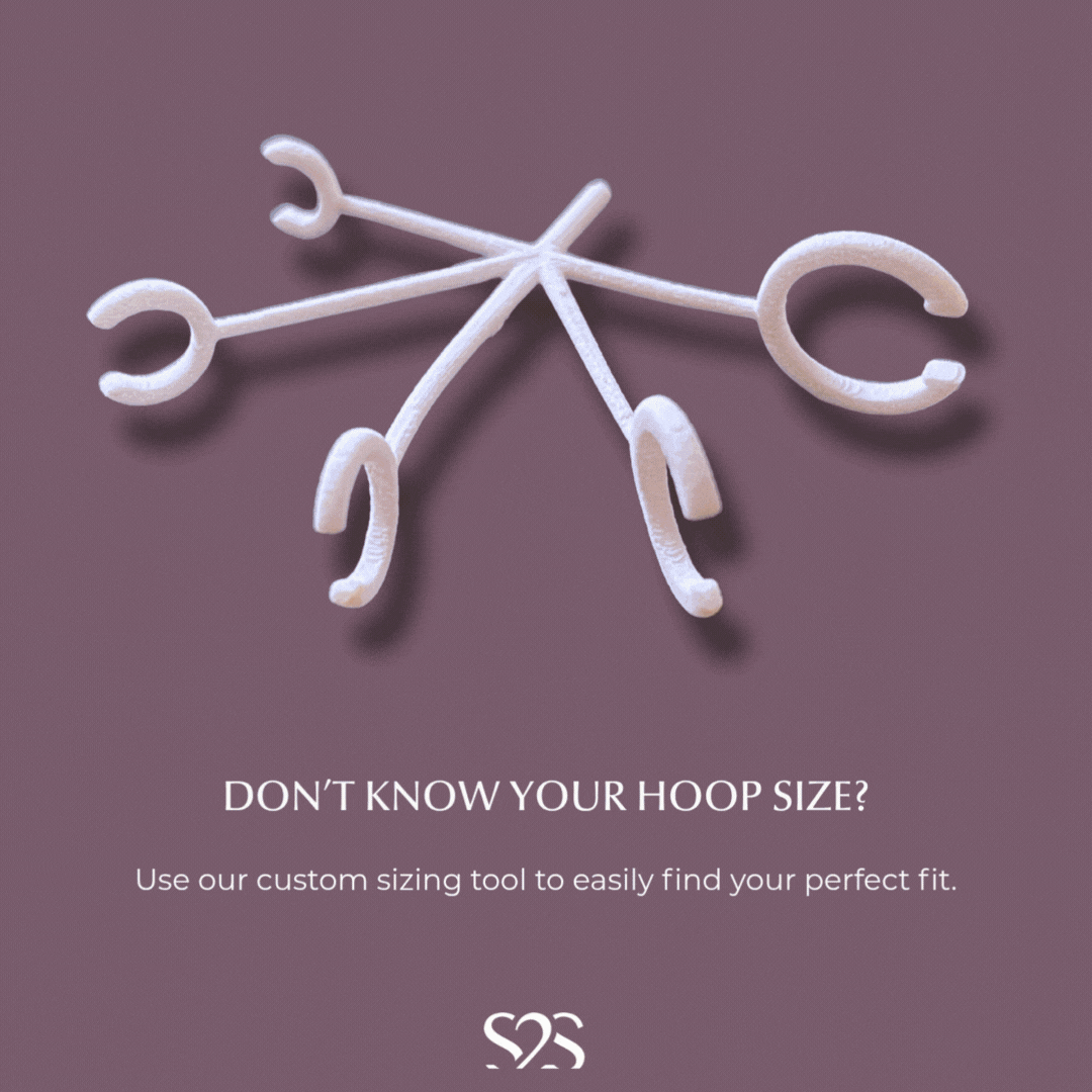 A plastic hoop sizing tool for Seed2Stone's leave-on earrings.